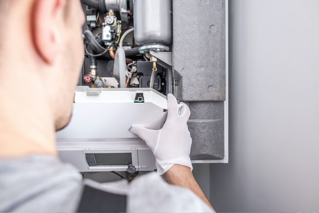 Heating and Air Conditioning Technician Working
